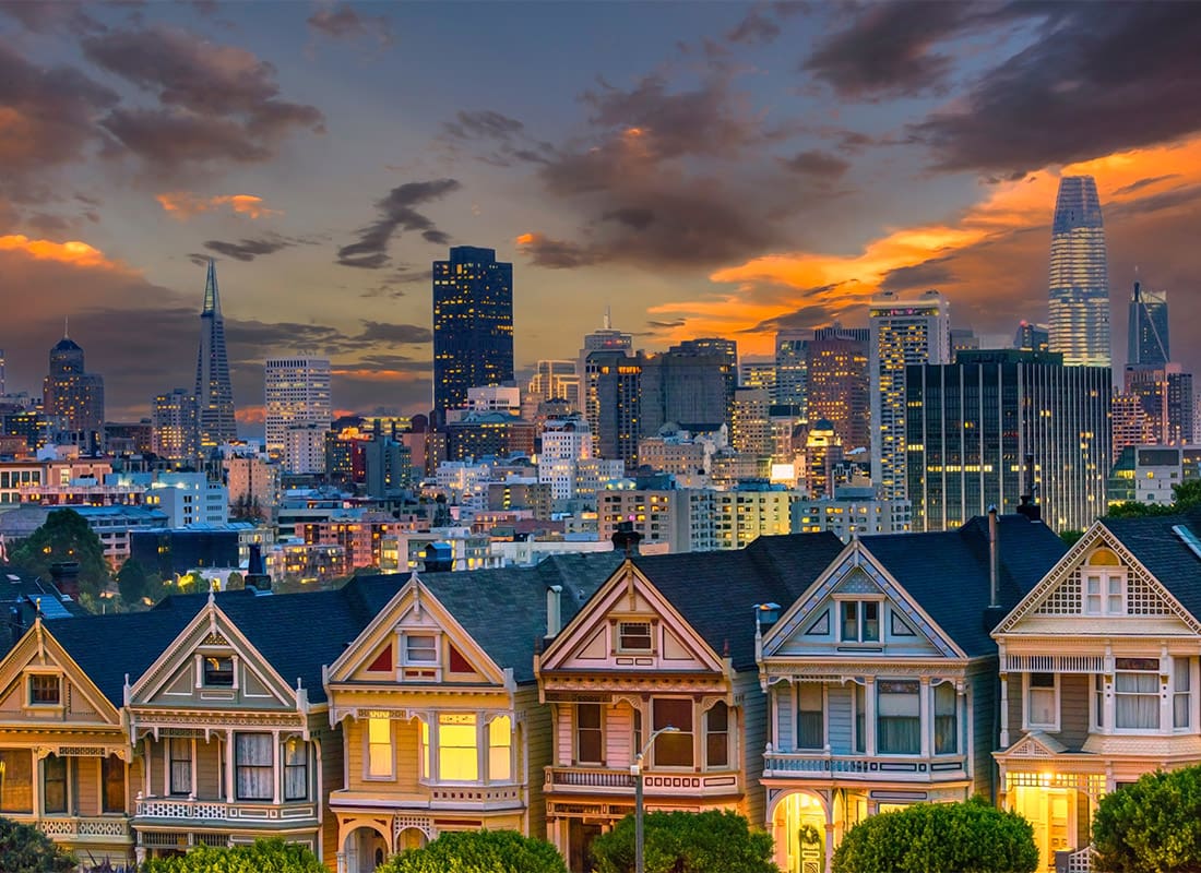 San Francisco, CA - Alamo Square and Painted Ladies With San Francisco Skyline in the Evening Hour